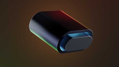 A minimalist cyan and black 3D model of a futuristic object.