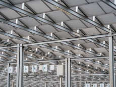 a large metal structure with lots of windows