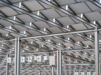 a large metal structure with lots of windows