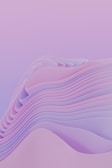 Gentle, flowing curves create an abstract landscape with layered, wave-like formations in soft pastel colors. The image has a serene, calming effect, resembling a dreamscape or an artistic interpretation of rolling hills.
