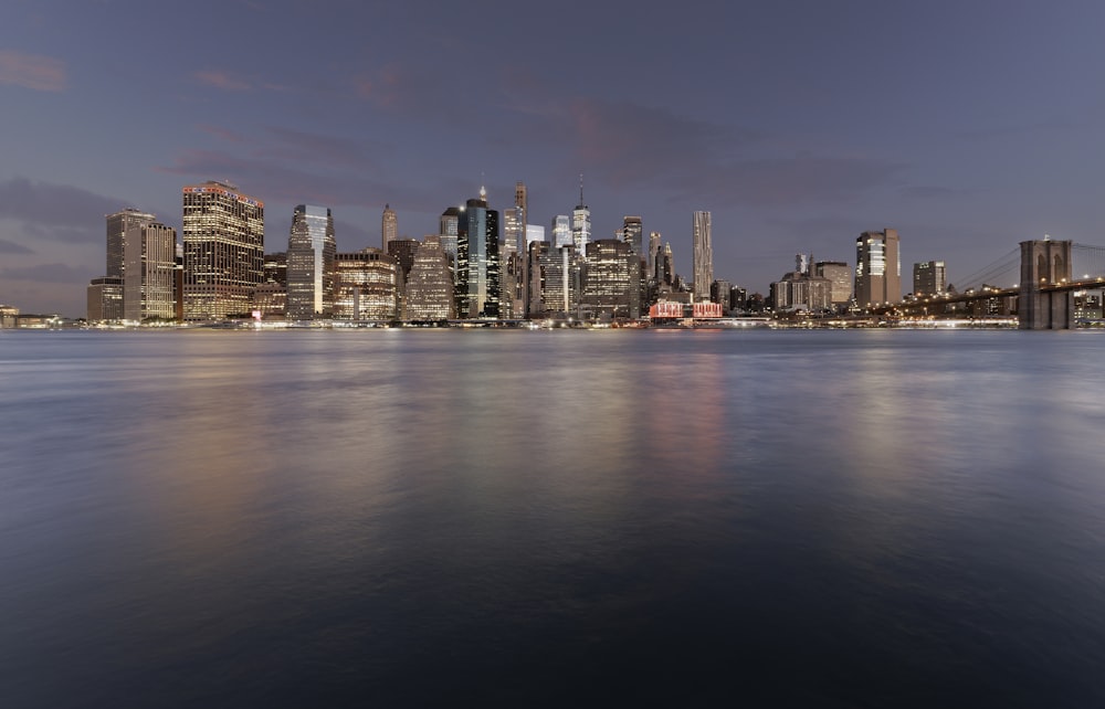 a view of a city at night from across the water