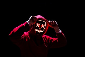 a person wearing a mask with a creepy face