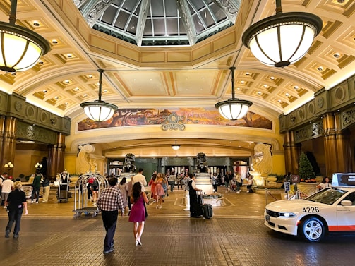 a couple of people that are walking in a building