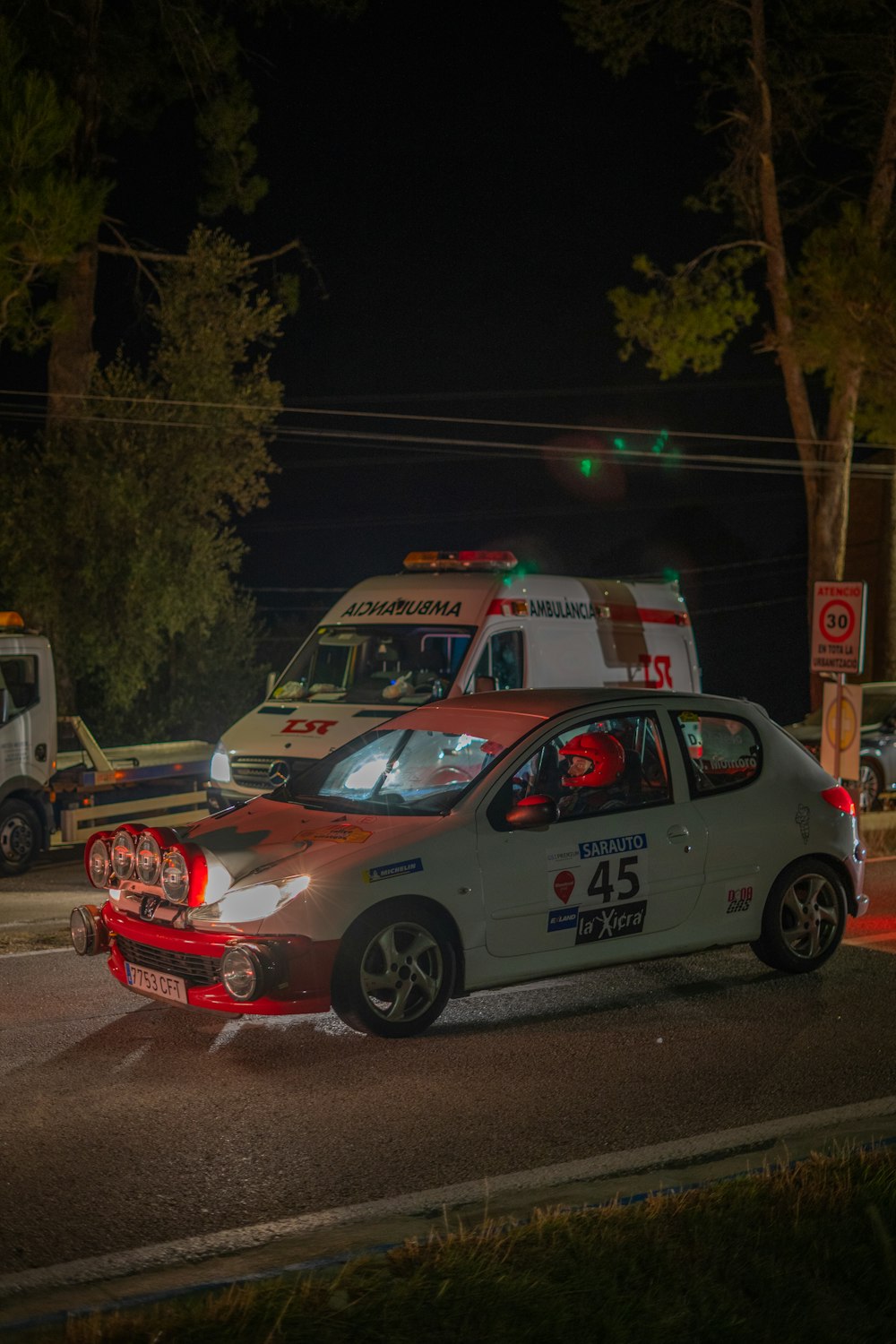 an ambulance is parked on the side of the road