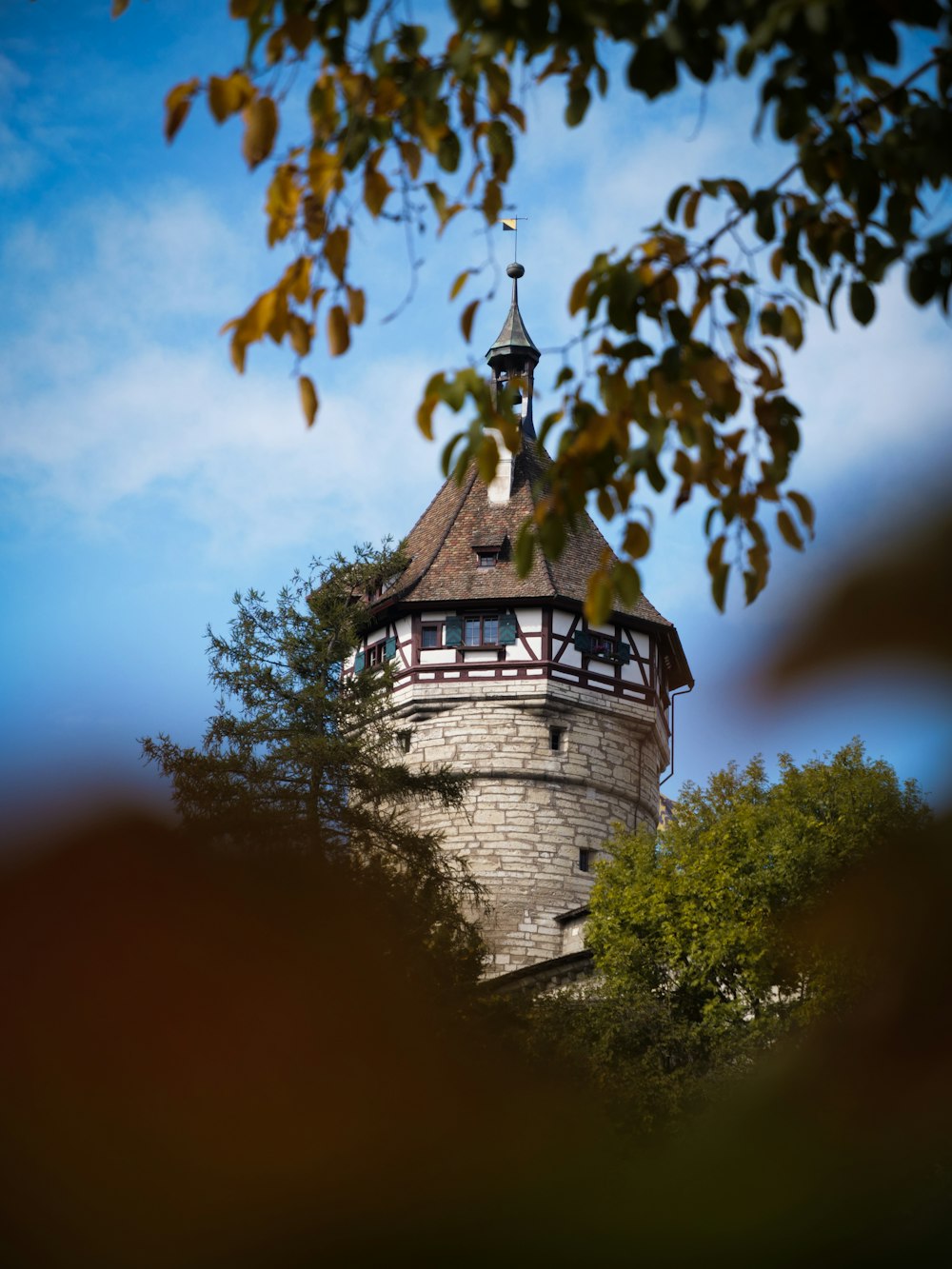 a tall tower with a clock on top of it