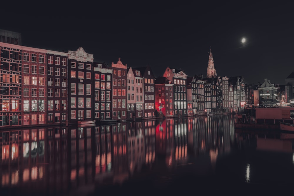 a view of a city at night from across the water