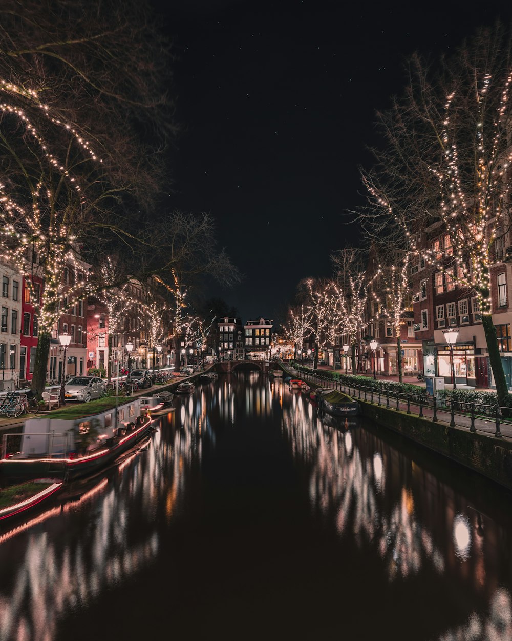 a canal that has some lights on it