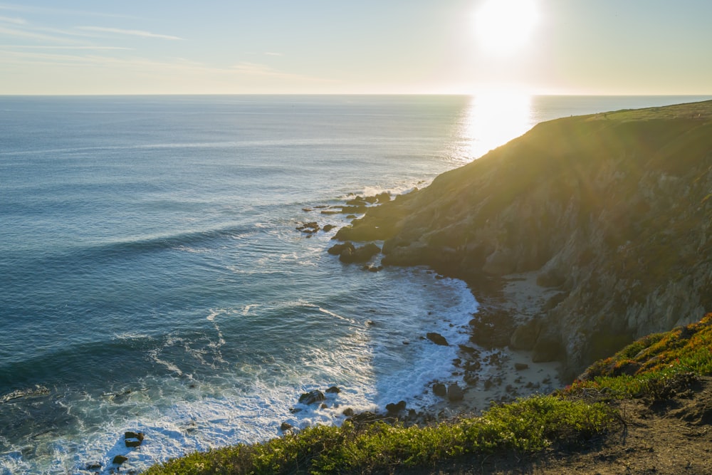 a view of the ocean from a cliff