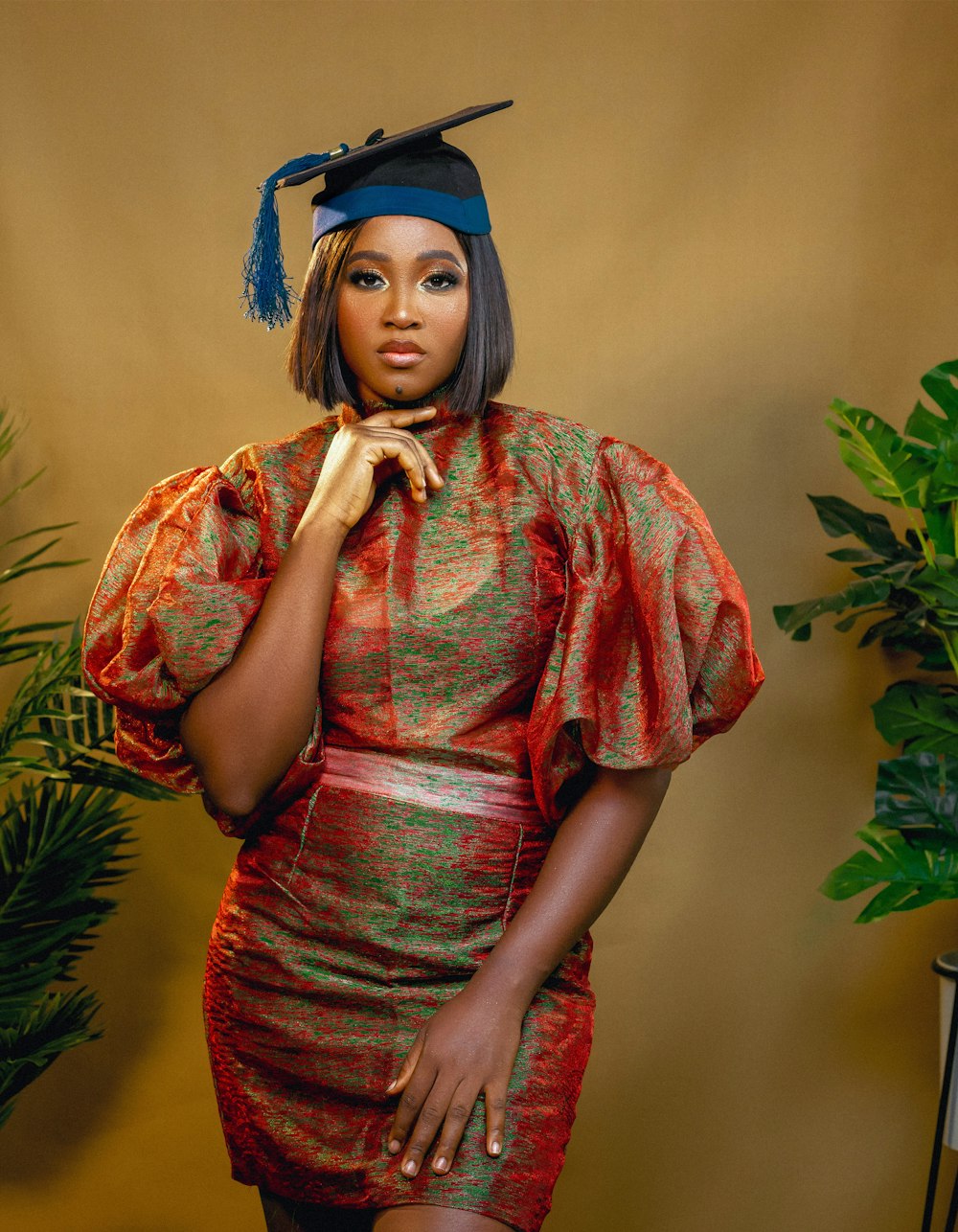 a woman wearing a graduation cap and gown