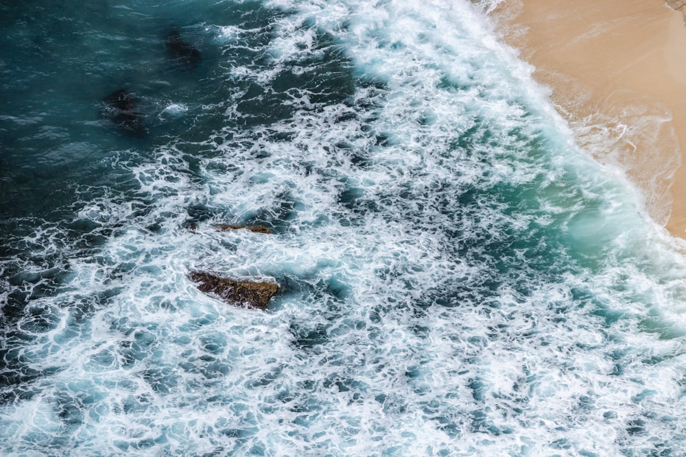 a bird's eye view of a beach and ocean