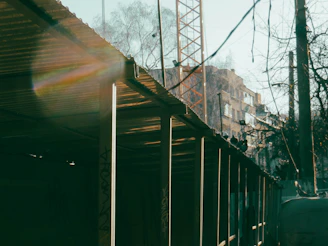 Steel frame structure being assembled on a sunny construction site in Campinas.
