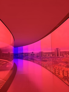 a view of a city through a glass wall