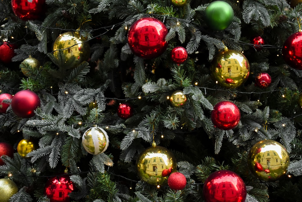 a close up of a christmas tree with ornaments