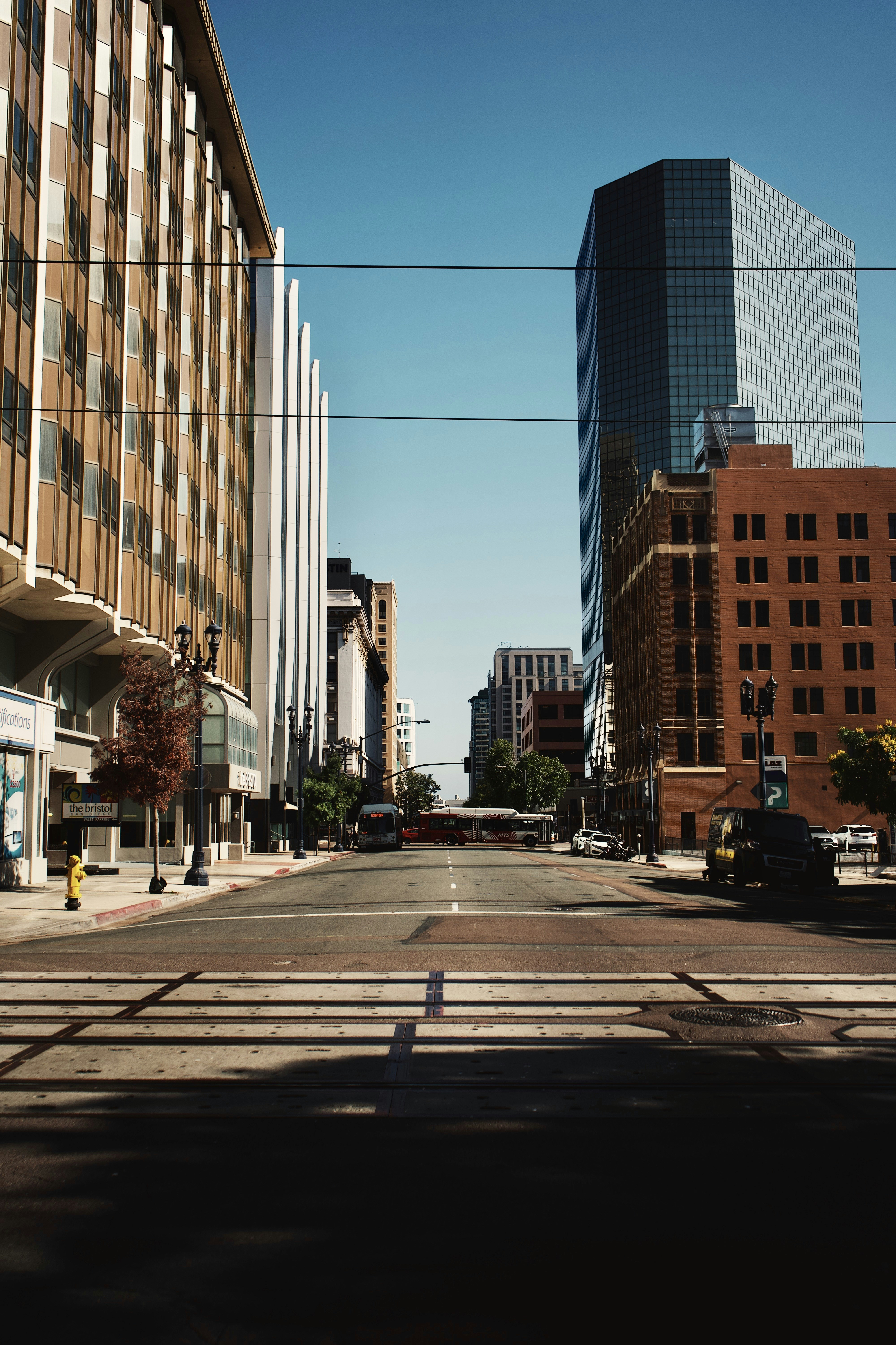 a city street lined with tall buildings