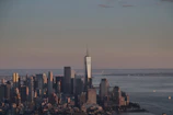 A sleek, modern city skyline at dawn symbolizing fresh opportunities.