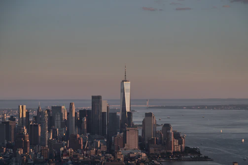 A sleek, modern city skyline at dawn symbolizing fresh opportunities.