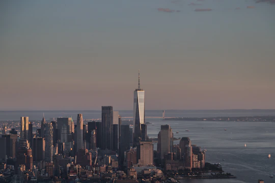A sleek city skyline at dawn symbolizing growth and ambition.