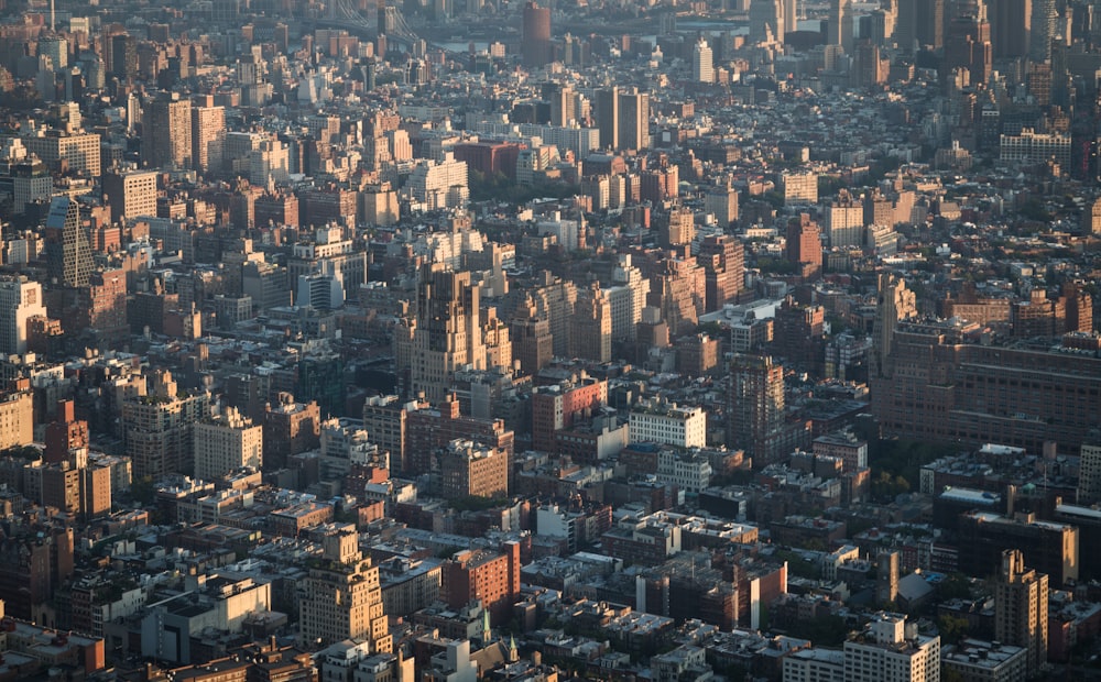 an aerial view of a city with tall buildings