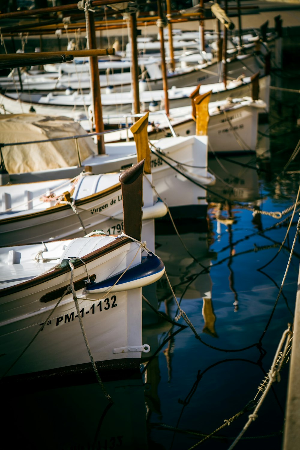 a bunch of boats that are sitting in the water