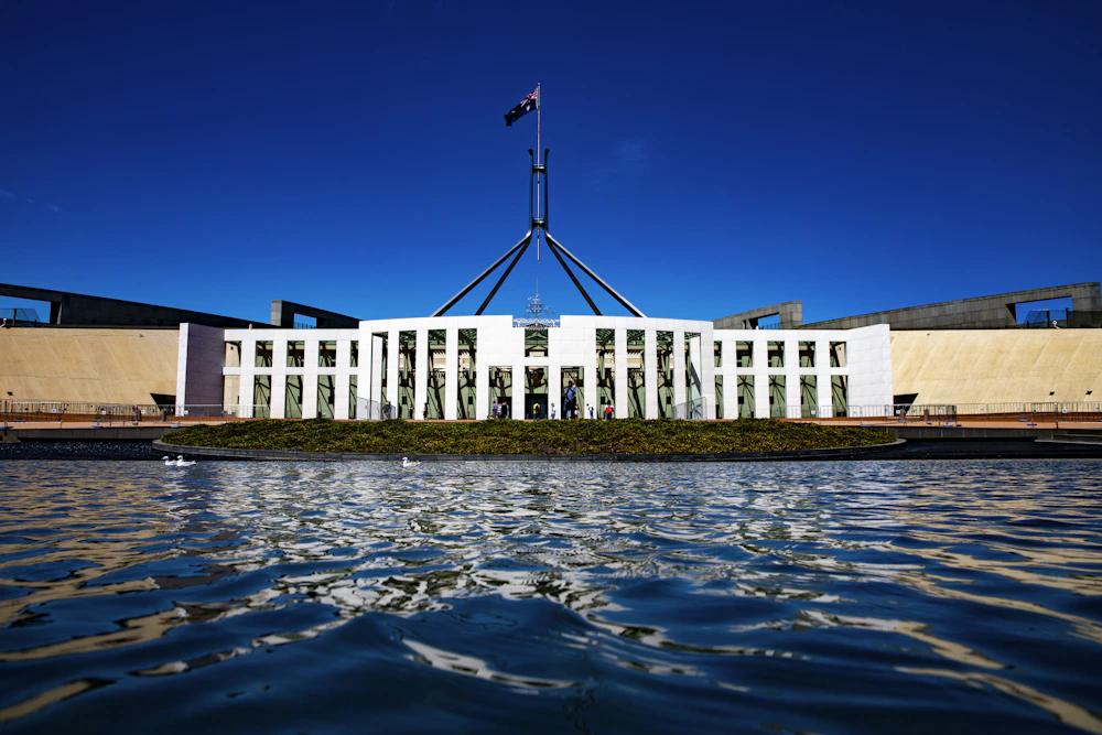 Australian Parliament House in Canberra with its flag mast