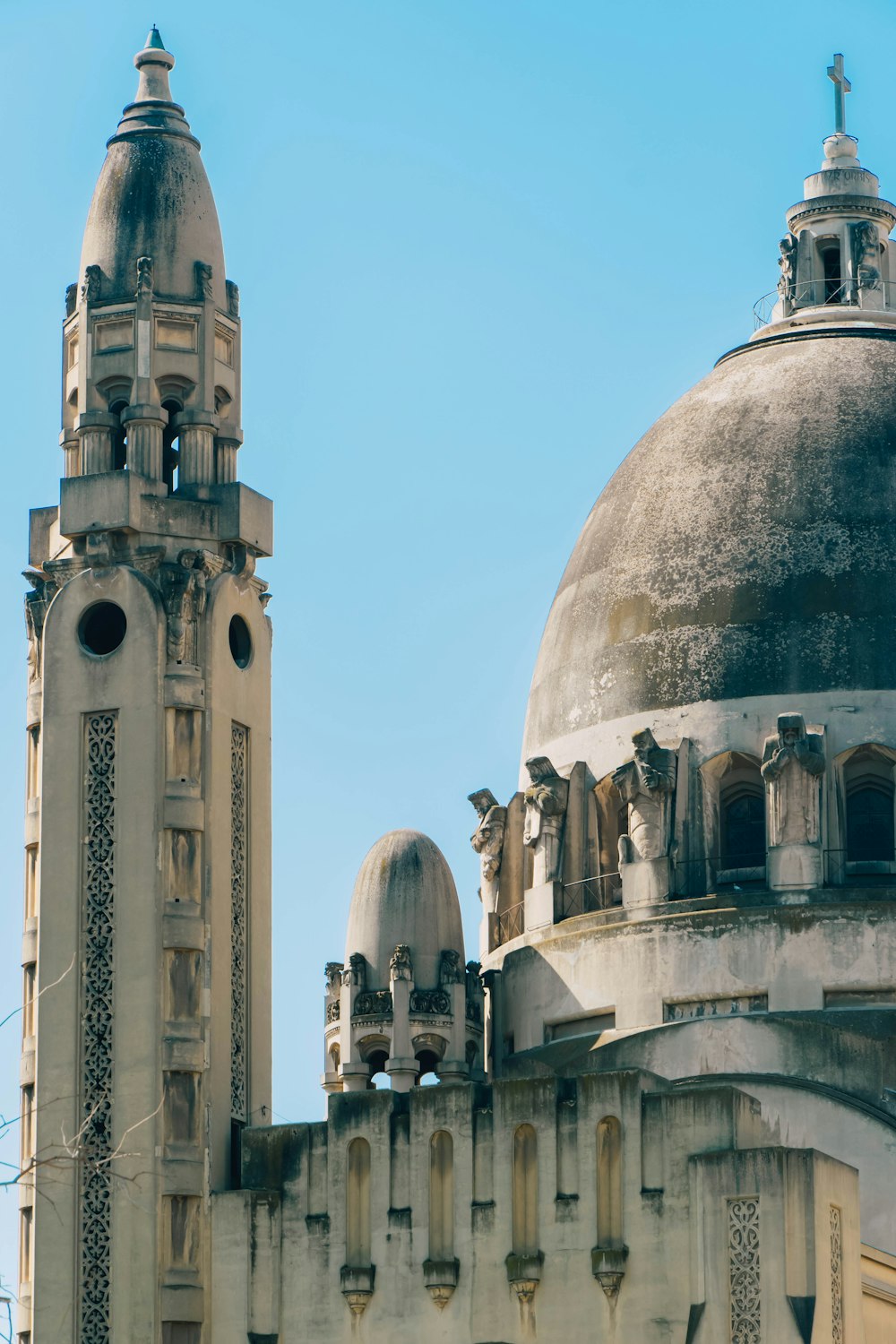 a large building with two towers and a clock