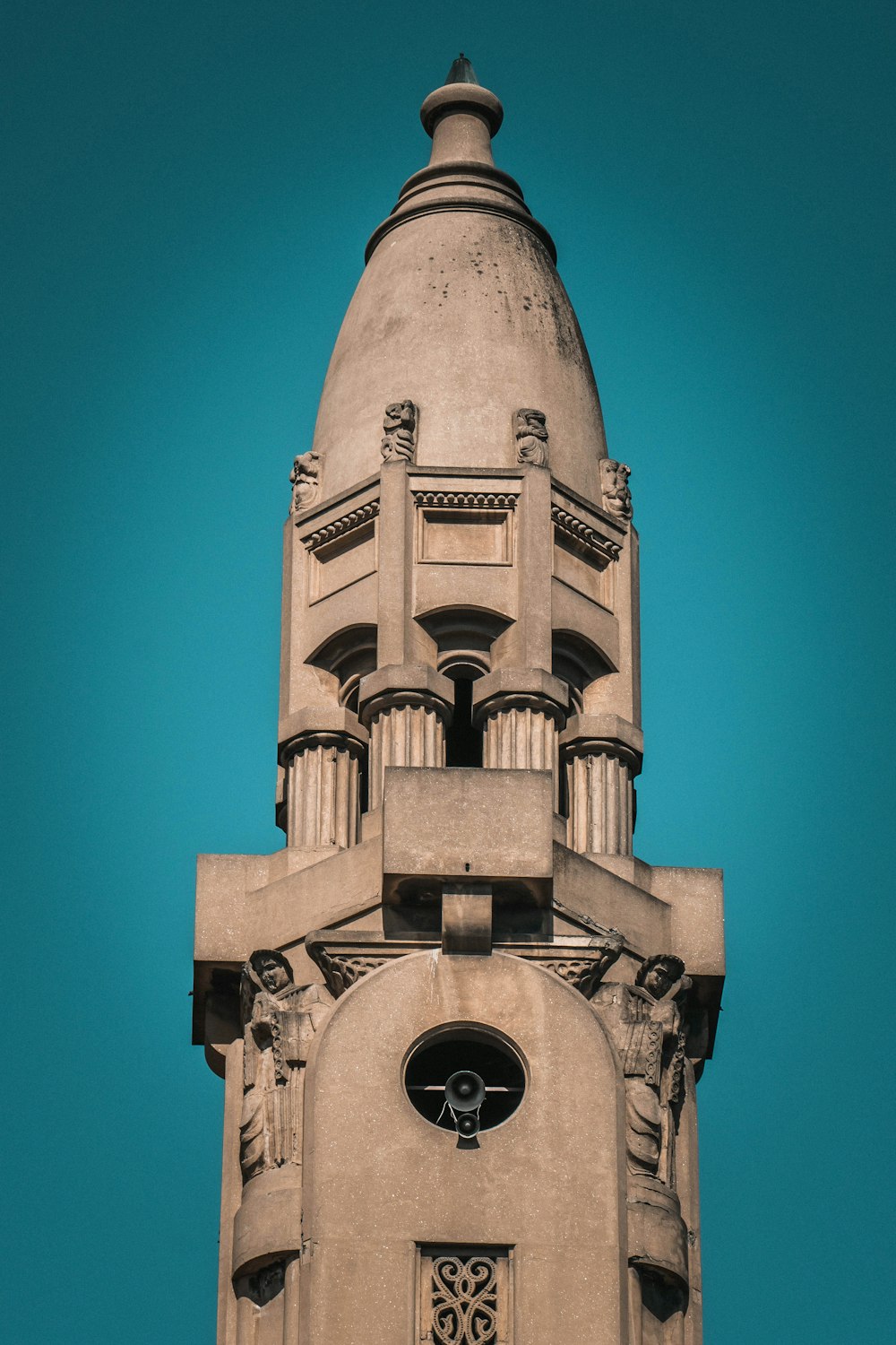 a tall clock tower with a sky background