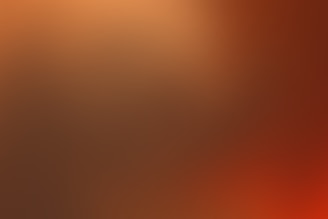 An abstract blend of copper and silver hues merging gently, evoking subtle alchemy.