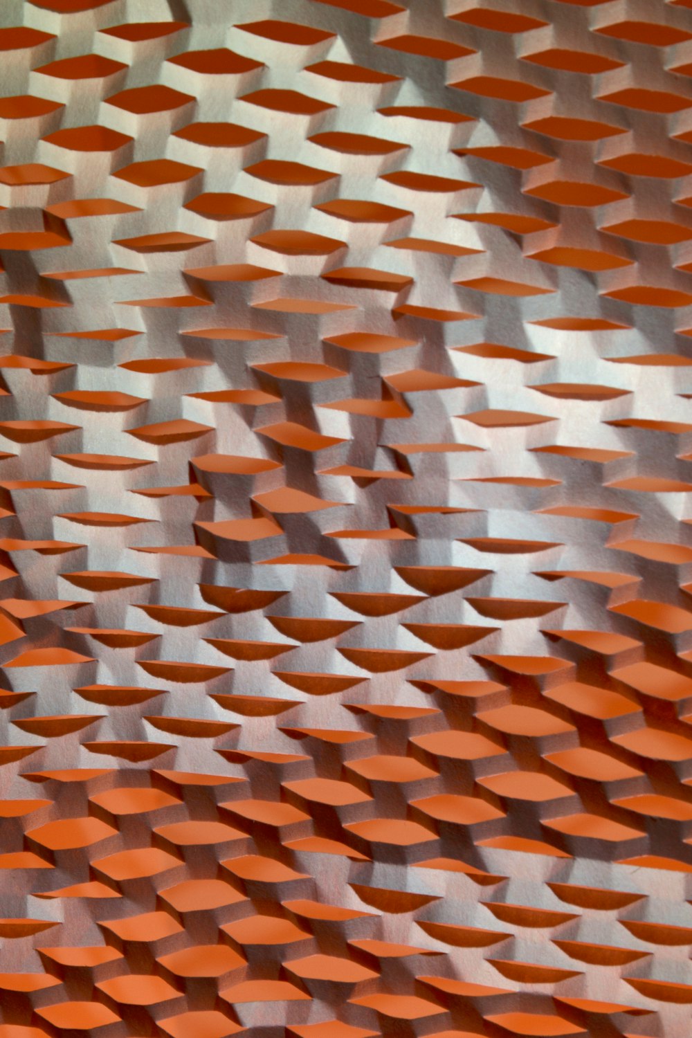 an abstract photo of a wall made of orange bricks