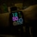 A digital smartwatch displays the time 12:50 with futuristic neon-colored numbers on a black background. Various health and activity metrics are visible below the time, including date, heart rate, and steps taken, indicated by glowing icons and numbers.