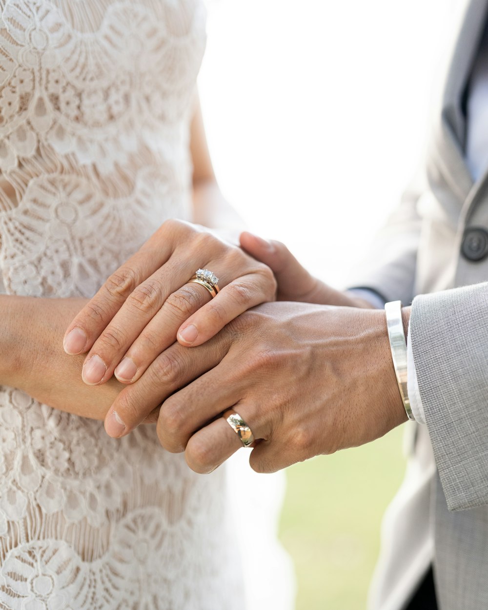 a close up of a person holding a person's hand