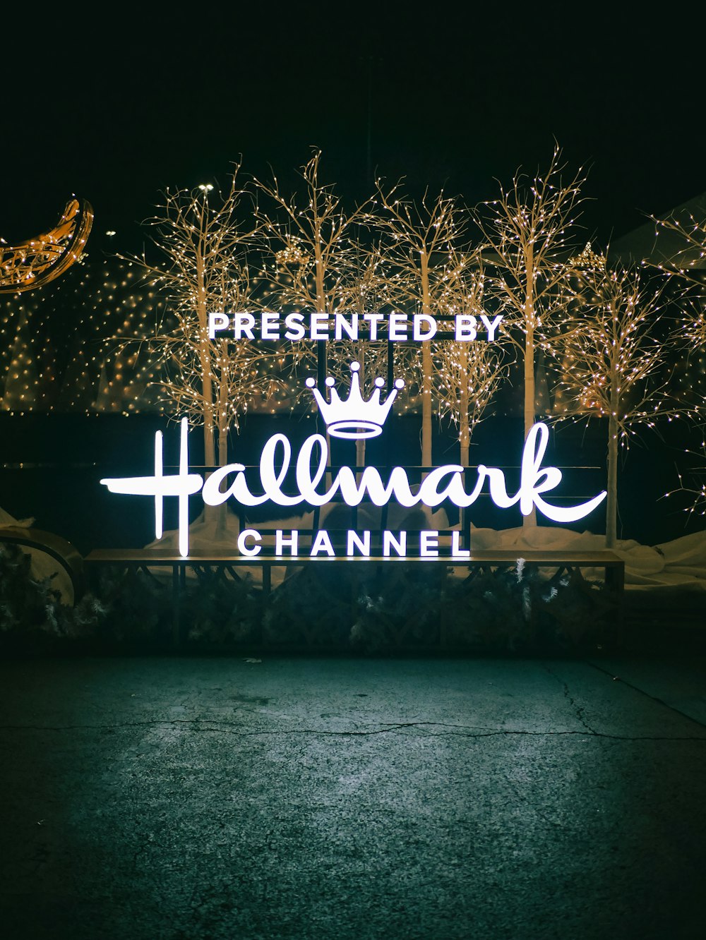 a lighted sign that reads, presented by halemark channel
