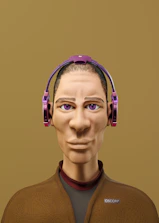Friendly cartoon axolotl mascot wearing headphones, symbolizing approachable customer service.