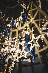 a bunch of lights hanging from a ceiling