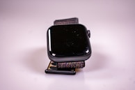 Close-up of a stylish smartwatch with a vibrant screen