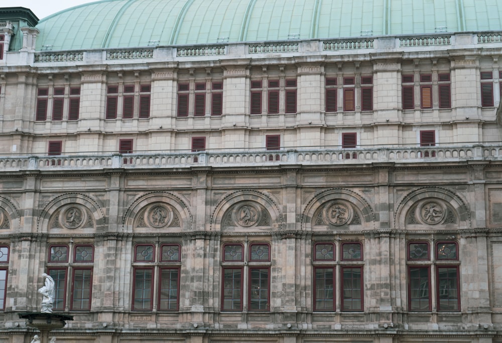 a large building with a clock on the front of it