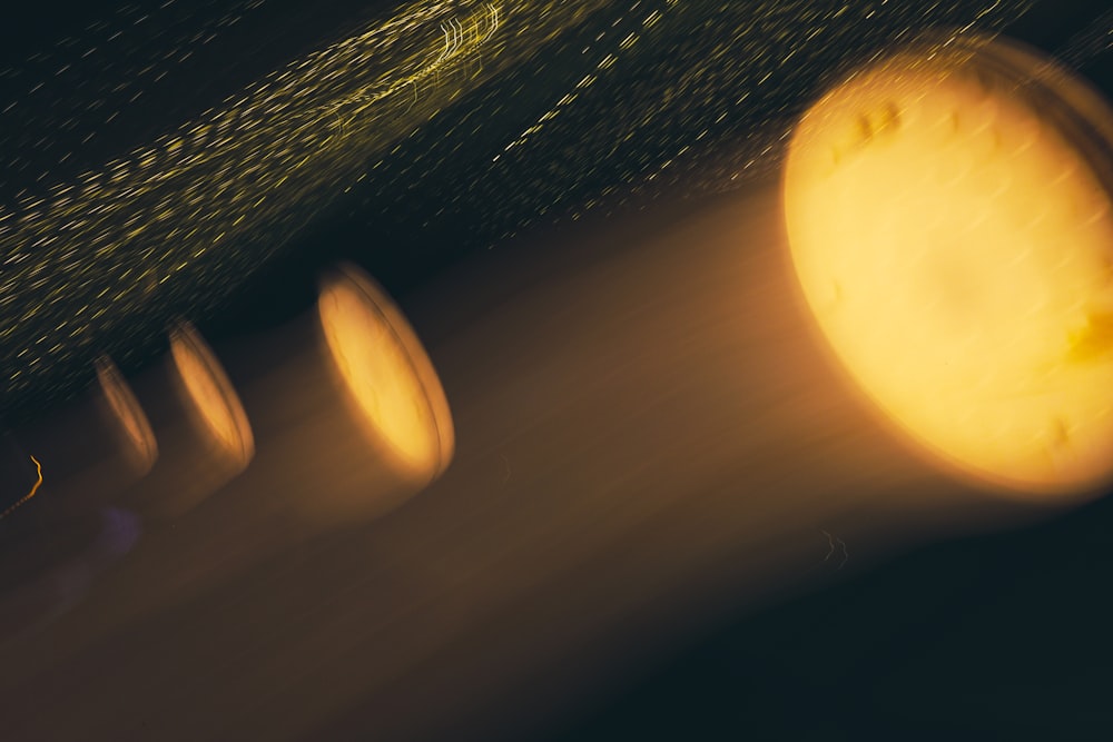 a blurry photo of a yellow object