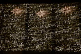 Radiant cosmic light beams merging with an intricate network of energy and life symbols.