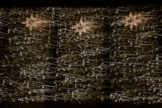 A dreamlike animation of stars aligning to form a mysterious ancient symbol.