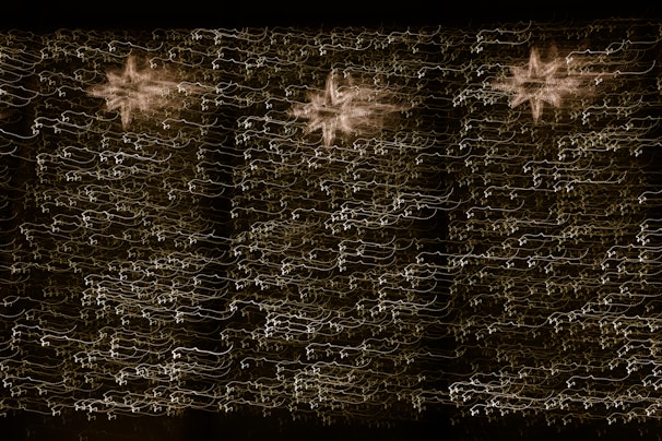 A dreamlike animation of stars aligning to form a mysterious ancient symbol.