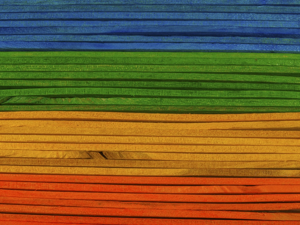a close up of a multicolored wooden surface