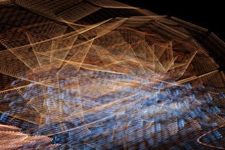 Abstract visualization of brain waves and quantum particles in blue and gold tones.