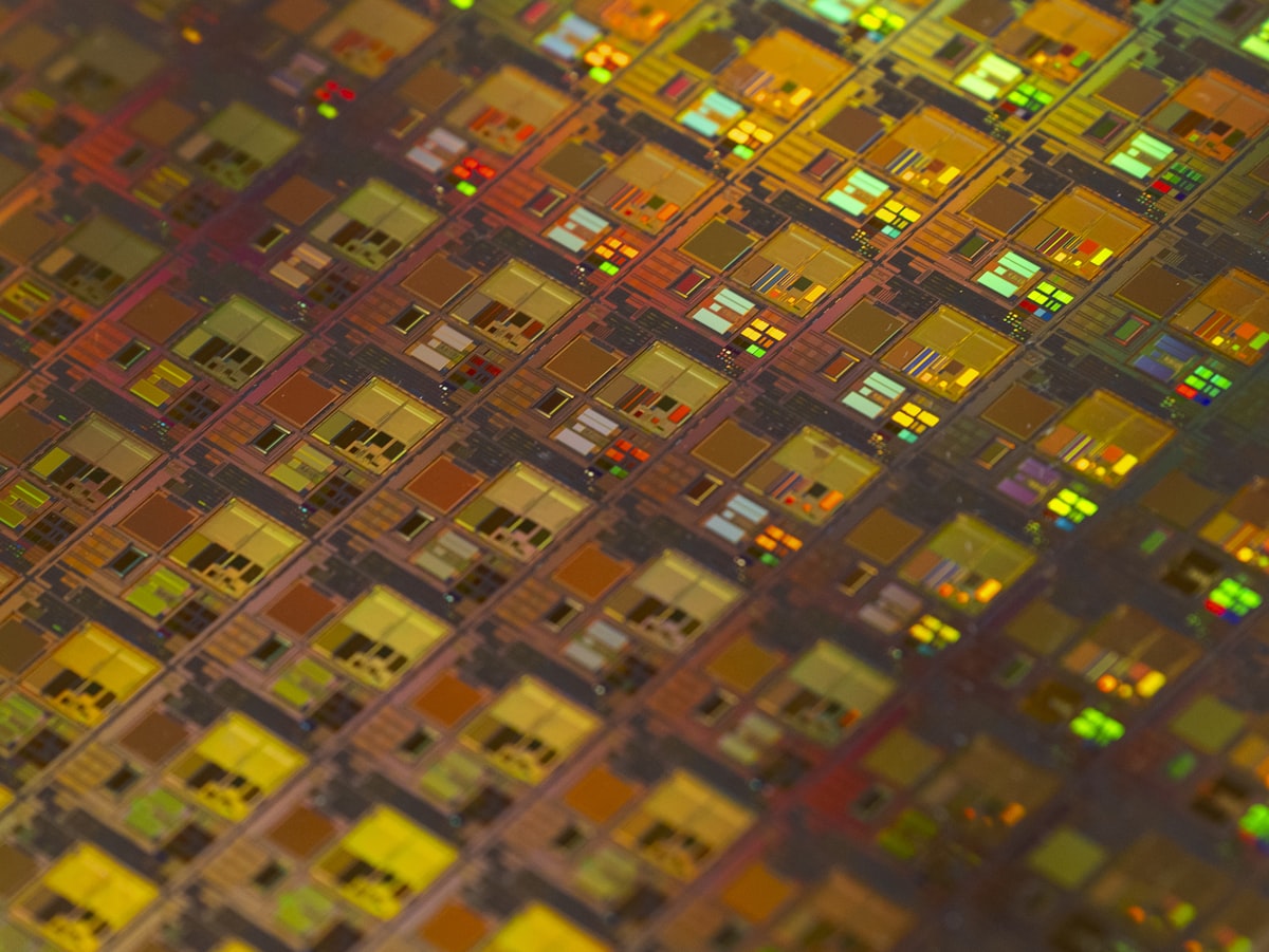 Close-up of a semiconductor chip representing the AI computing infrastructure at the heart of OpenAI's record fundraise