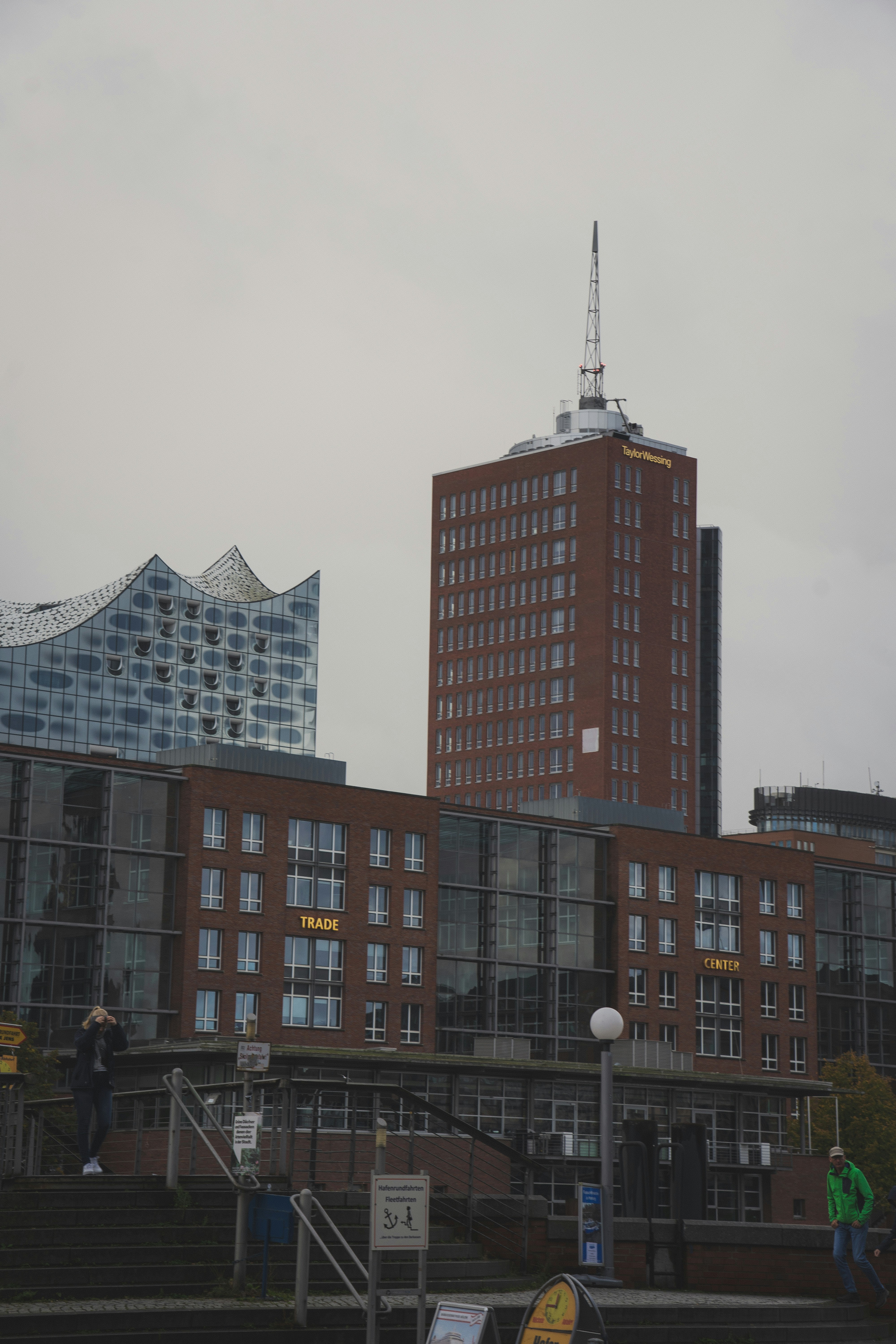 a tall building with a sky scraper in the background