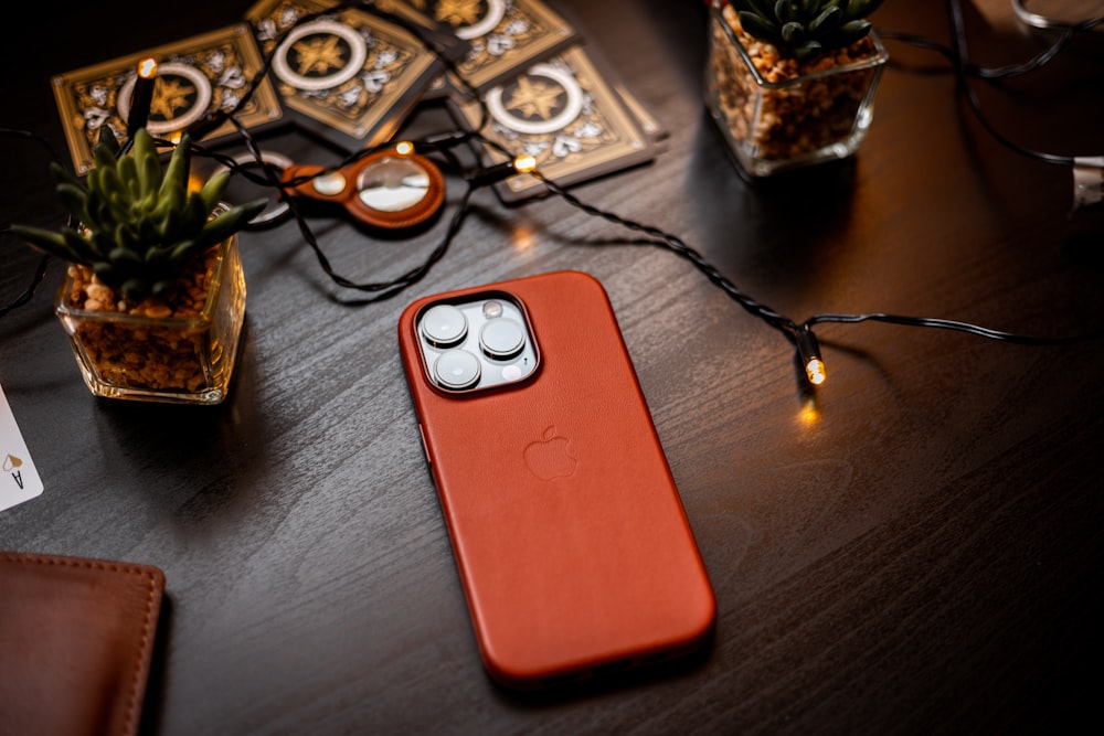 an orange case sitting on top of a wooden table