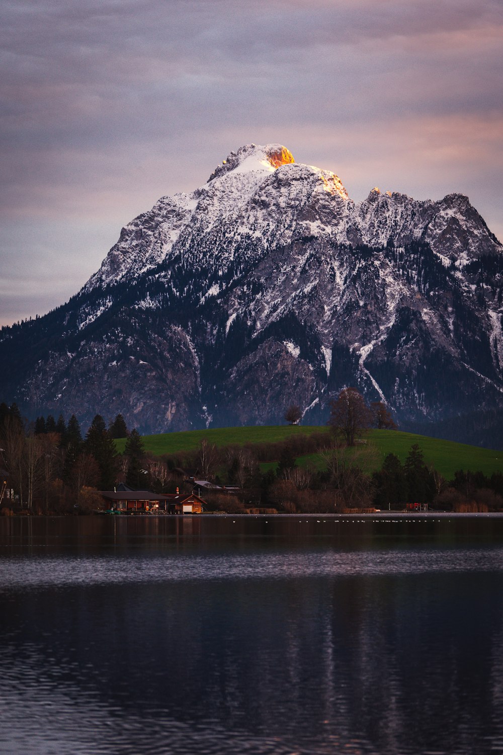 a mountain with a lake in front of it