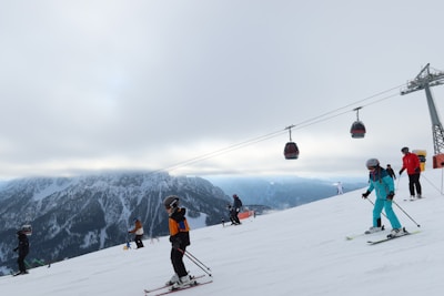 A group of skiers enjoying a snowy mountain.