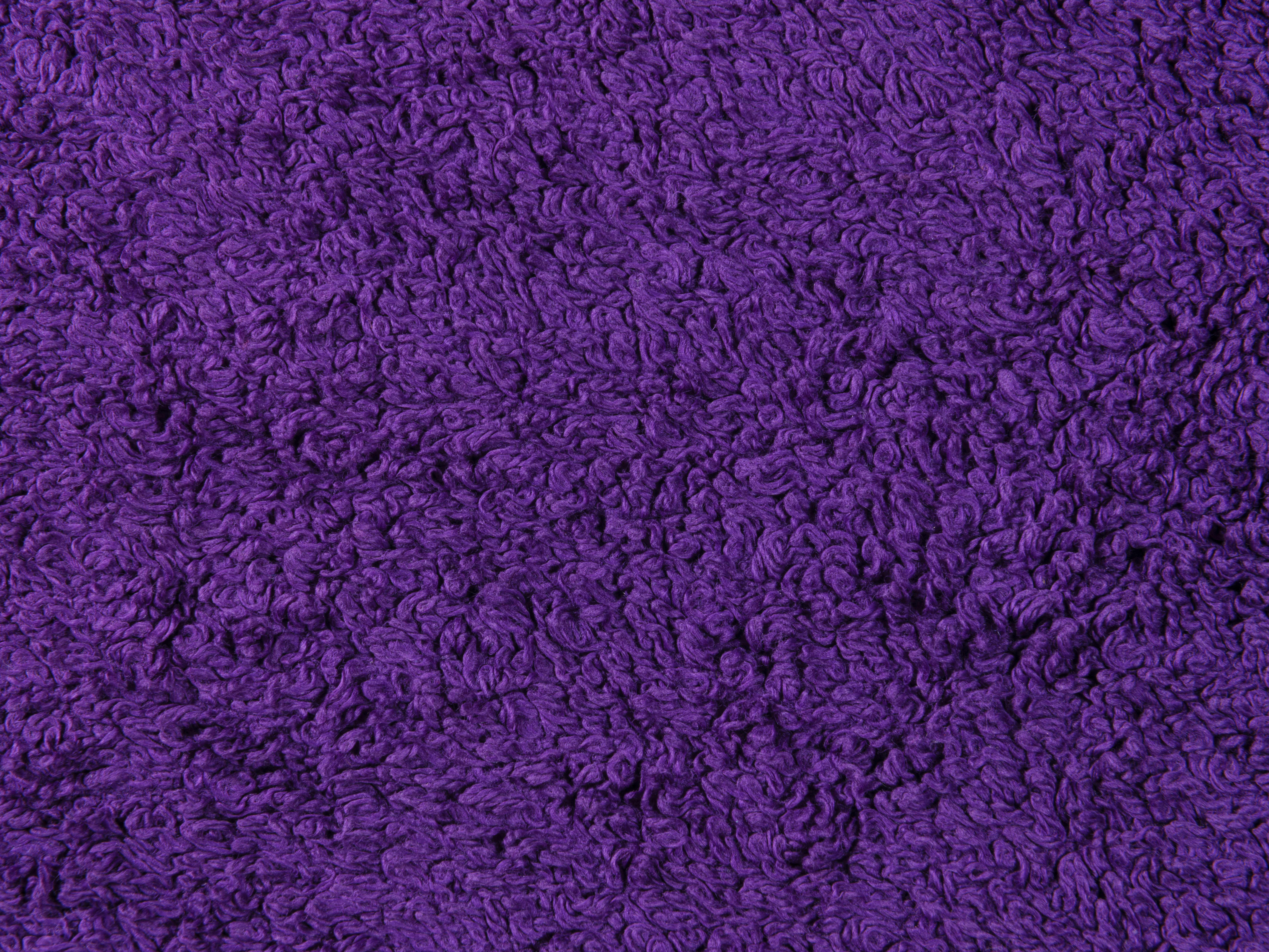 A close up view of a purple rug photo Free Texture Image on Unsplash