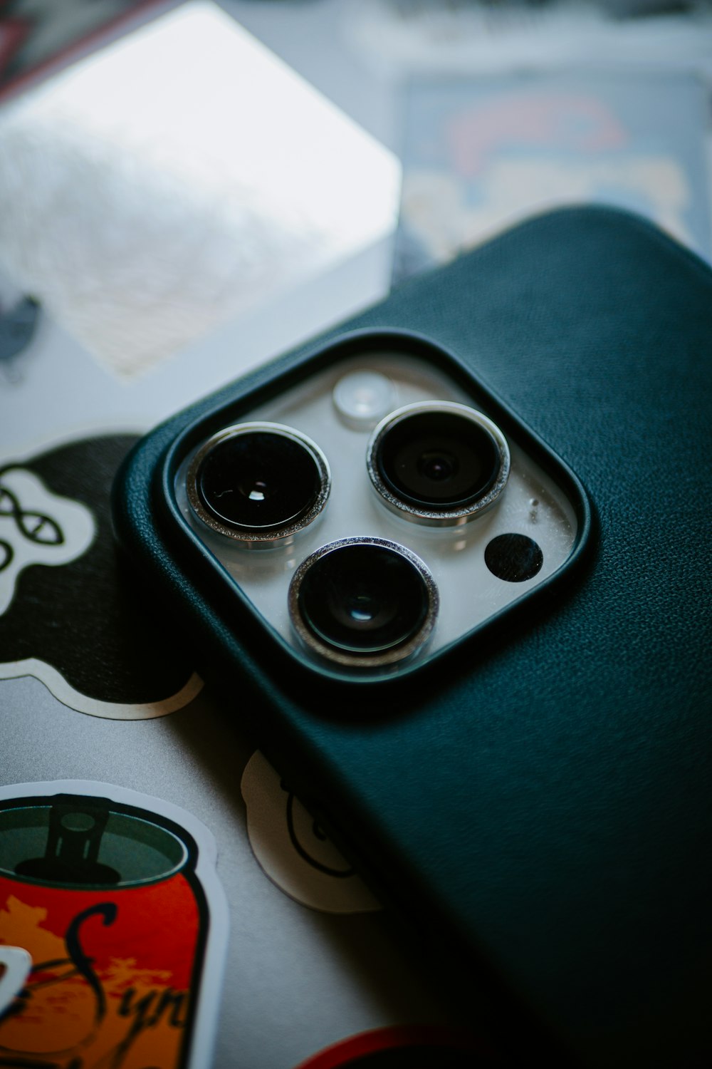 a close up of a cell phone on a table