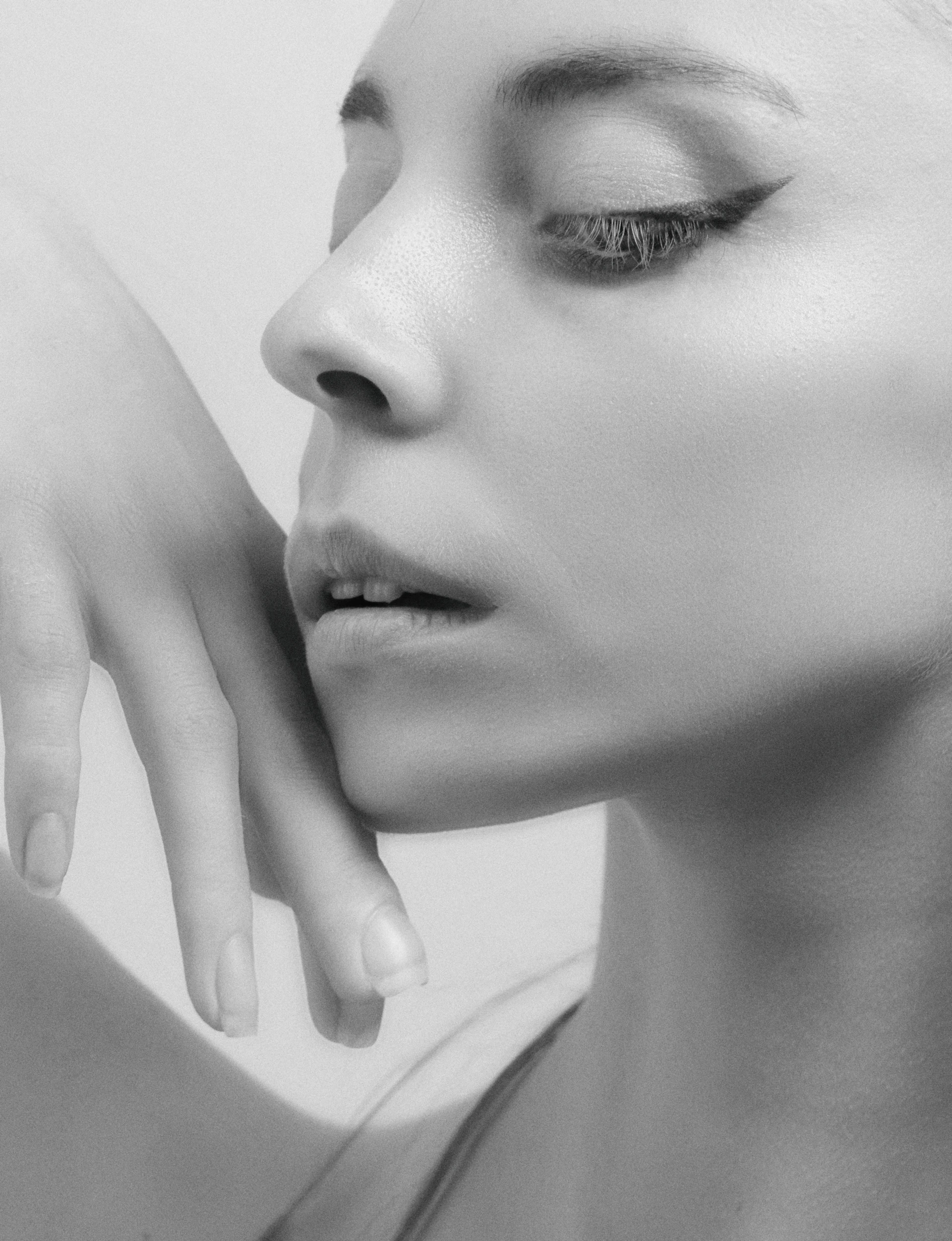 a black and white photo of a woman's face