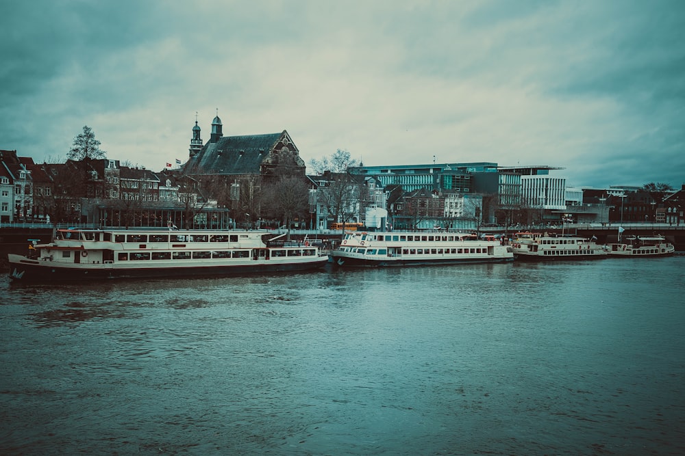 a couple of boats that are sitting in the water